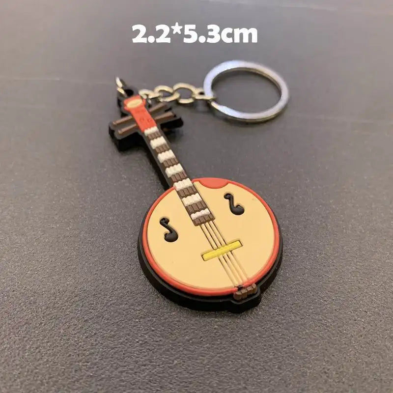Miniatyrbilde: musical Instrument Keychain Silicone Guitar Piano Saxophone Key Chain Backpack C
