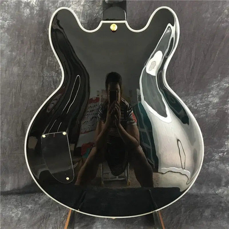 Μικρογραφία: Guitare électrique black jazz, avec micro doré, bouclier de perles rouges, servi