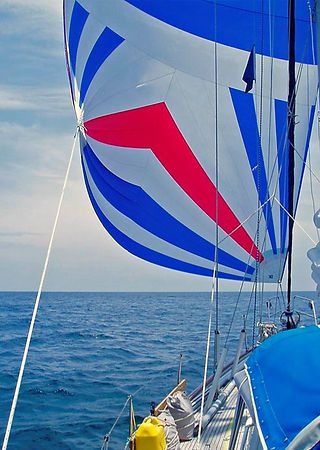 Departing Panama. MPS flying as Karinya sails on calm seas in light winds