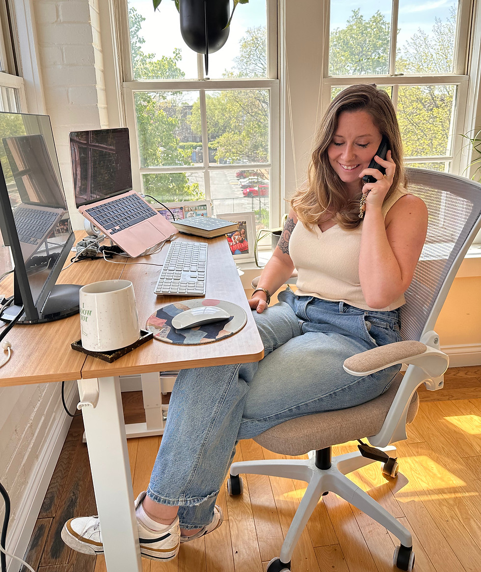 Dizzie, small business strategist, talking on the phone