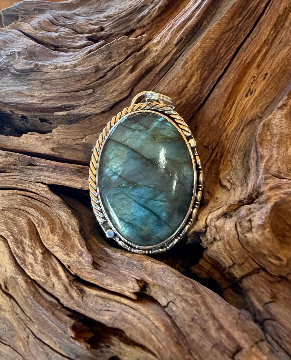 Labradorite pendant, electric blue teal gold flash, twisted rope border, handcrafted Taos, New Mexico