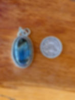 Deep electric blue flash labradorite oval pendant, twisted rope border, oxidized finish, handcrafted Taos, New Mexico