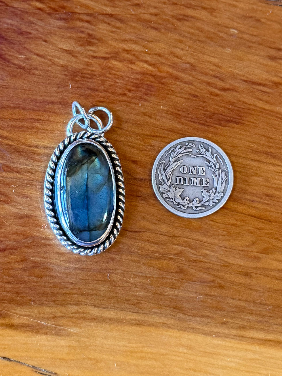 Deep electric blue flash labradorite oval pendant, twisted rope border, oxidized finish, handcrafted Taos, New Mexico
