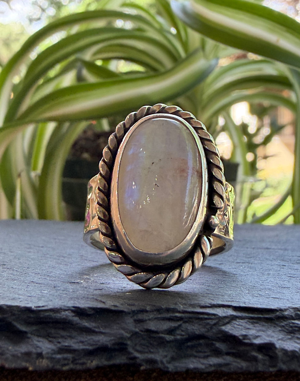 Moonstone ring with twisted rope silver bezel, handcrafted in Taos, New Mexico