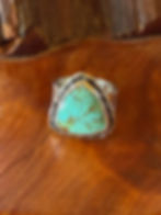 Kingman turquoise trillion ring with rope-twist silver bezel, handcrafted in Taos, New Mexico