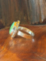 Hammered sterling silver band beneath pear-shaped turquoise, Southwest artisan jewelry