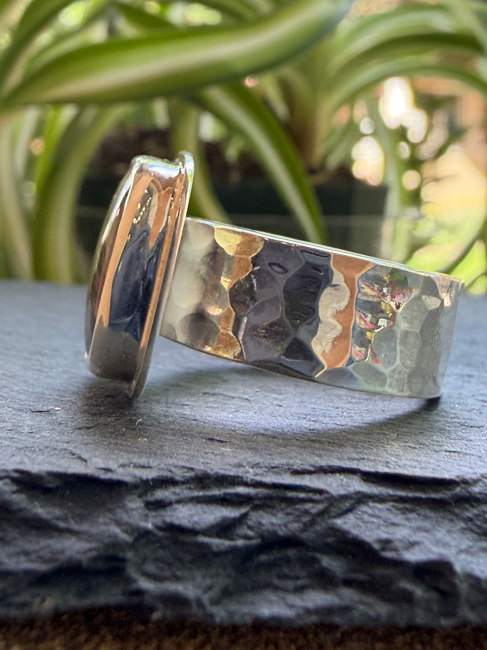 Hammered sterling silver band beneath smoky jasper stone, Southwest artisan jewelry