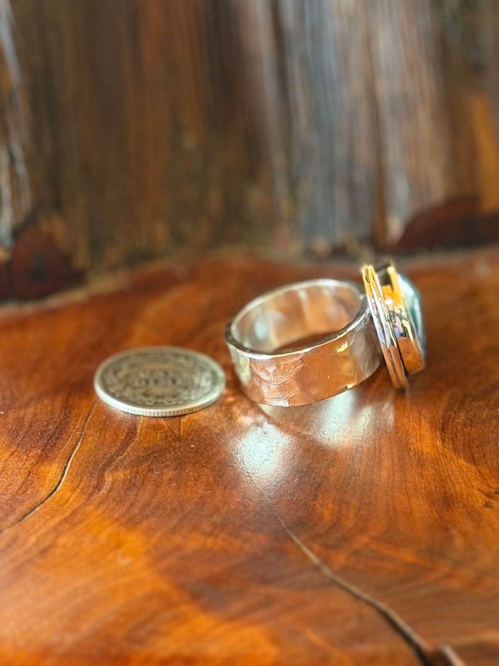 Side view 8mm hammered sterling silver band on Morenci II pyrite turquoise ring, Southwest artisan Fire & Stone Taos