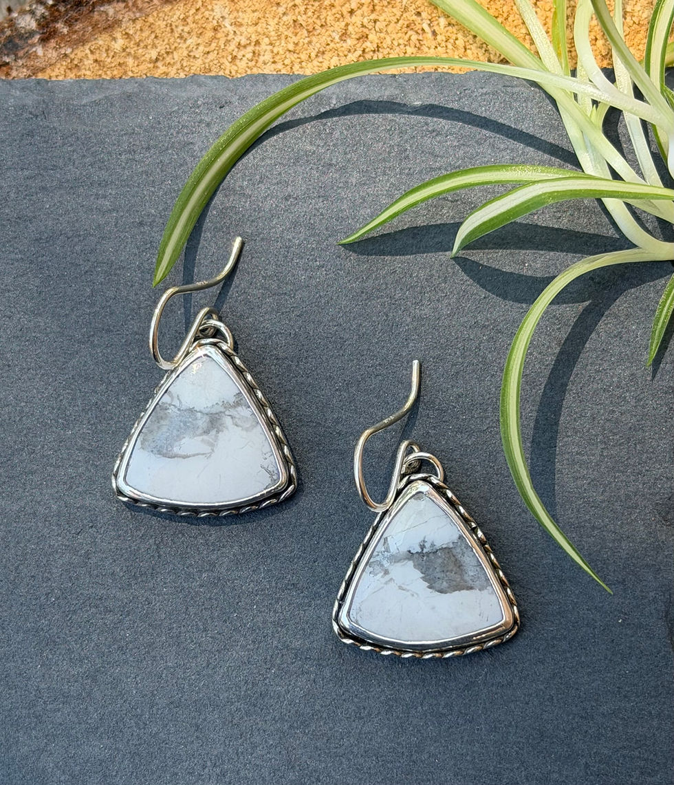 White howlite triangle earrings with mismatched silver bezels, handcrafted in Taos, New Mexico