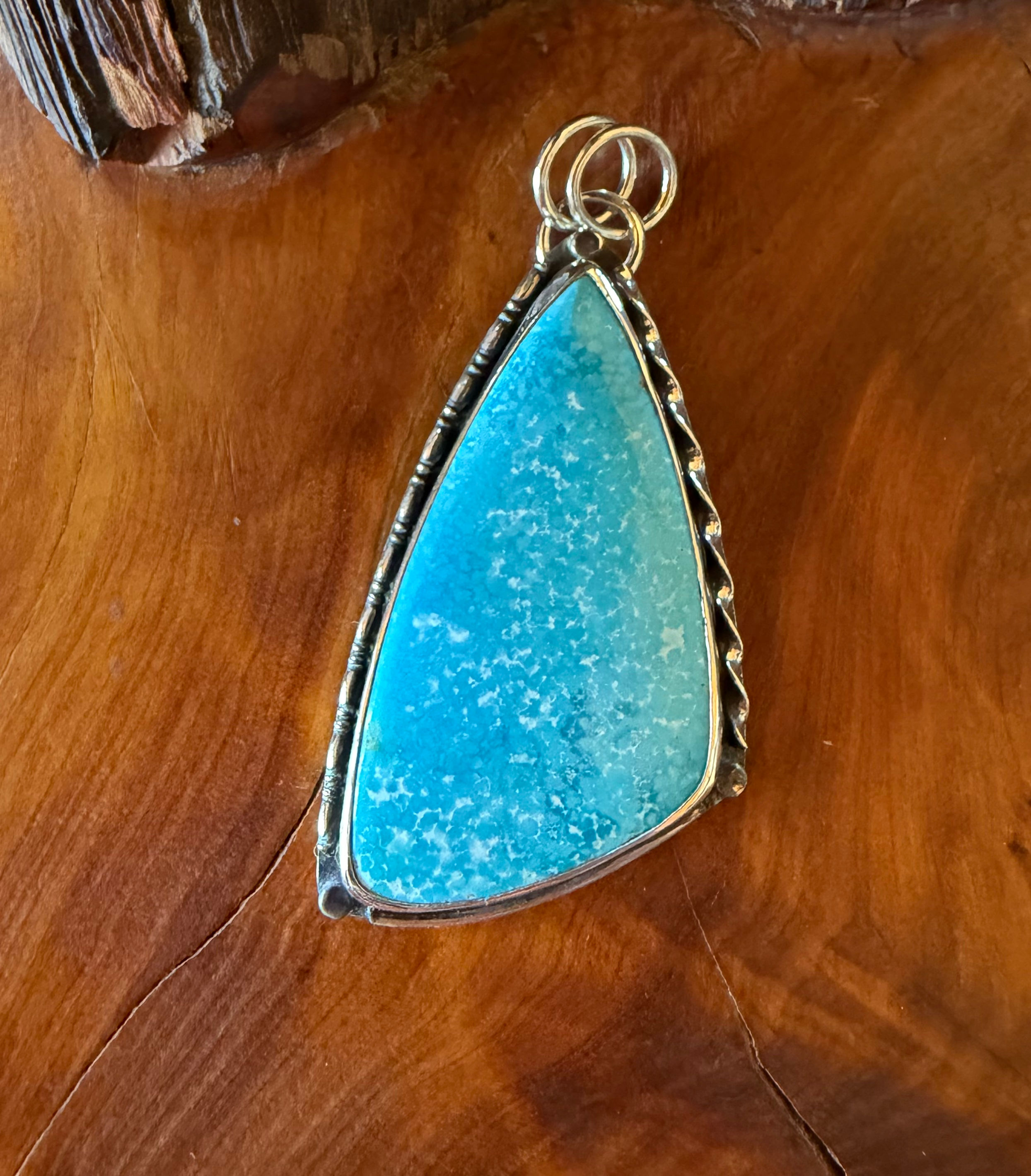 Open triangular back plate on Kingman turquoise pendant, hand-stamped artist maker’s mark, Southwest artisan silversmith