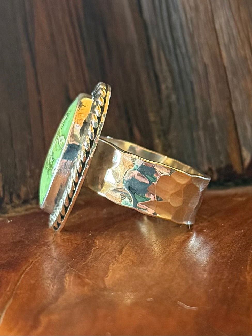 Sonoran turquoise oval ring, vivid lime green cream matrix, heavy twisted rope border, oxidized finish, Taos, New Mexico