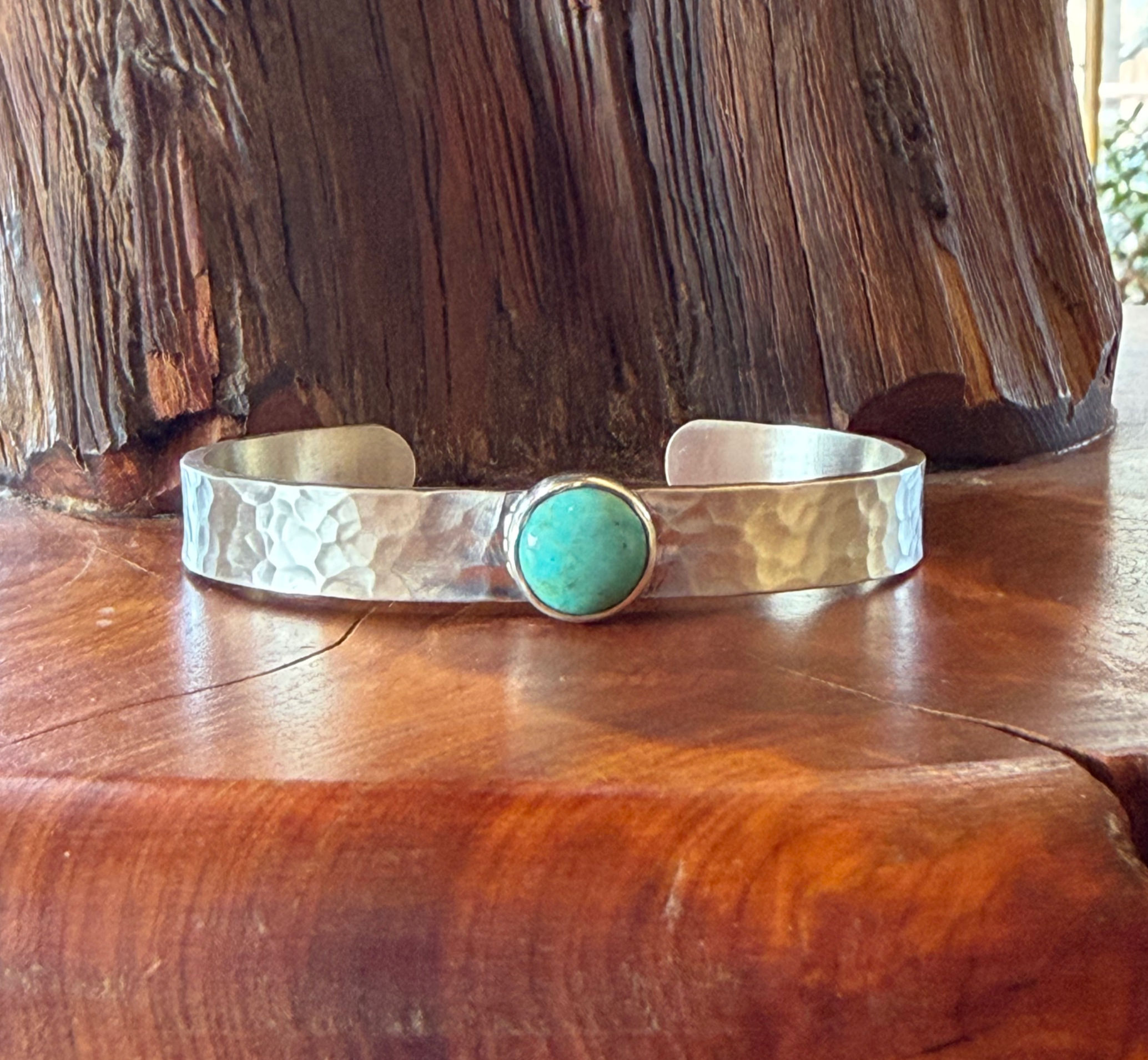 Kingman turquoise cuff with high-gloss stone on matte hammered silver, handcrafted in Taos, New Mexico