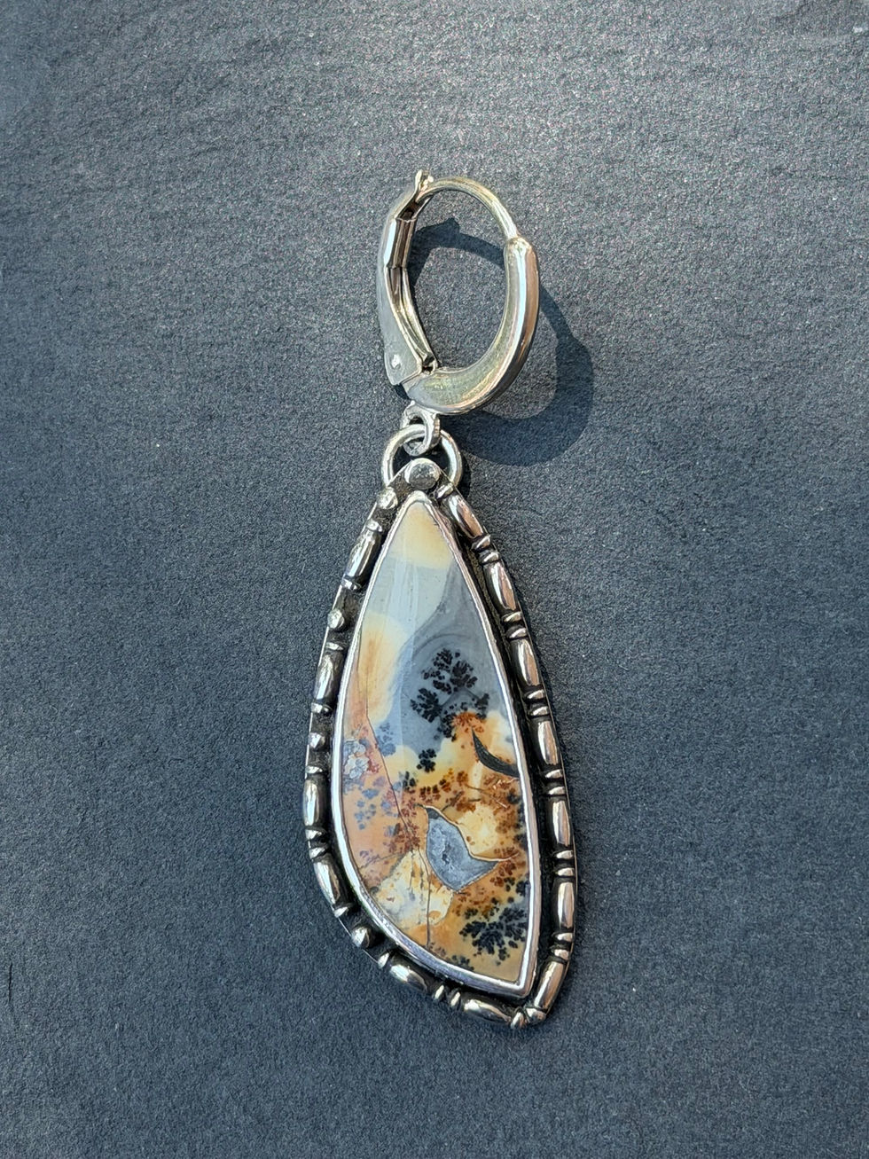 Open-back sterling silver bezel and hand-stamped maker's mark, Southwest artisan jewelry