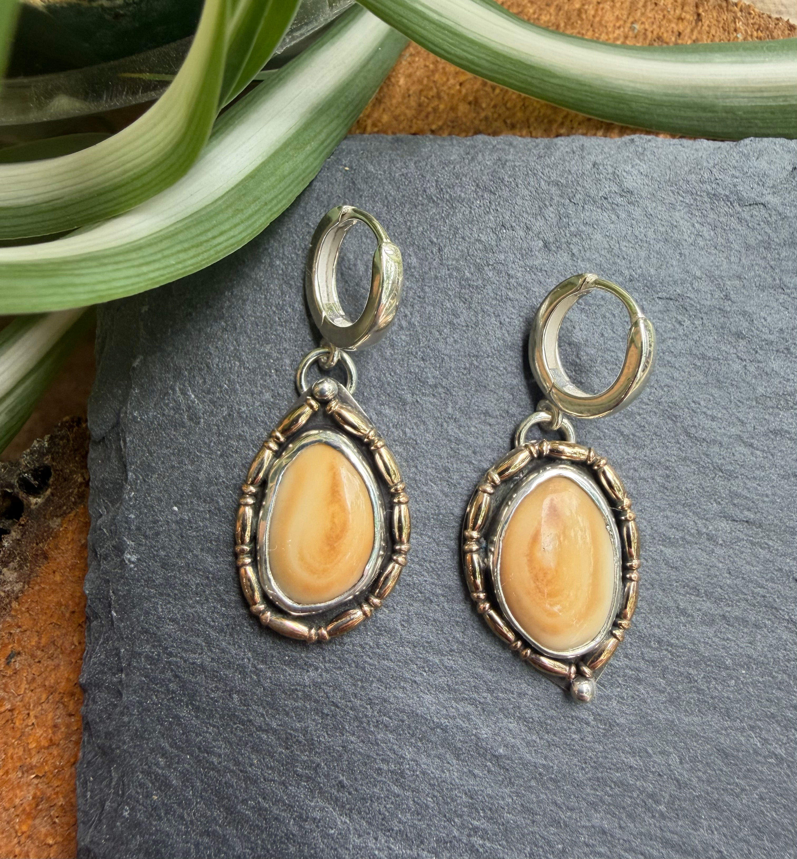 Elk ivory oval earrings in ribbed gold-filled setting, handcrafted Taos, New Mexico