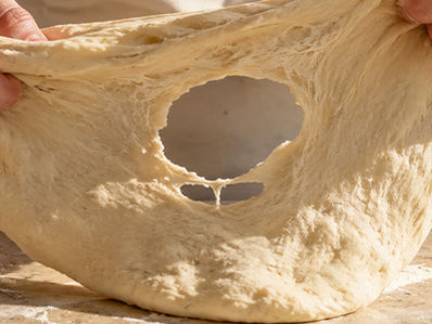 Why Does My Pizza Dough Tear When I Stretch It?