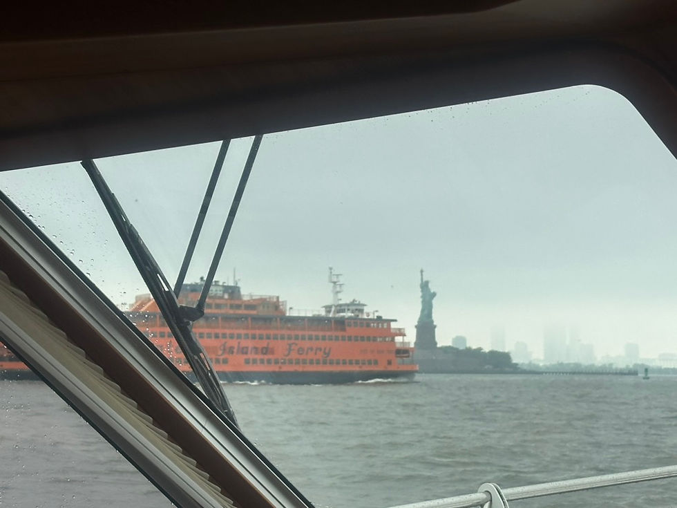 The Staten Island Ferry Overtaking Us at the Statue of Liberty