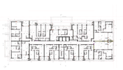 Desenho técnico de planta baixa de prédio de apartamentos, com indicações de tipos de alvenarias