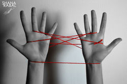 Hand and a Red Thread 1