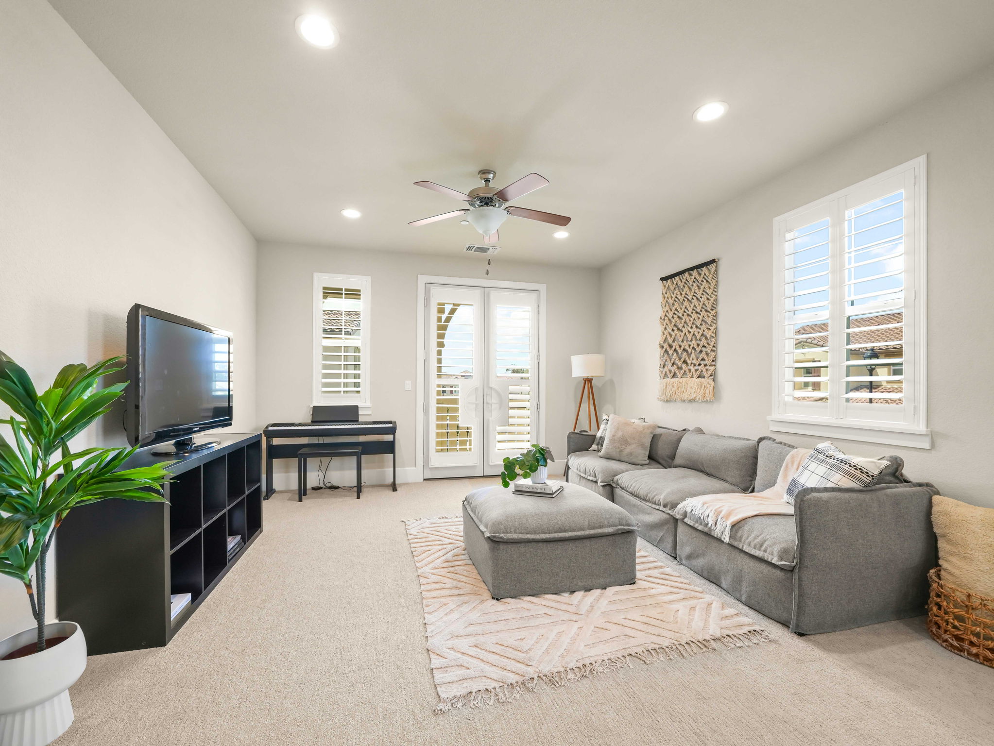 A peaceful master suite featuring elegant lighting and spacious layout.