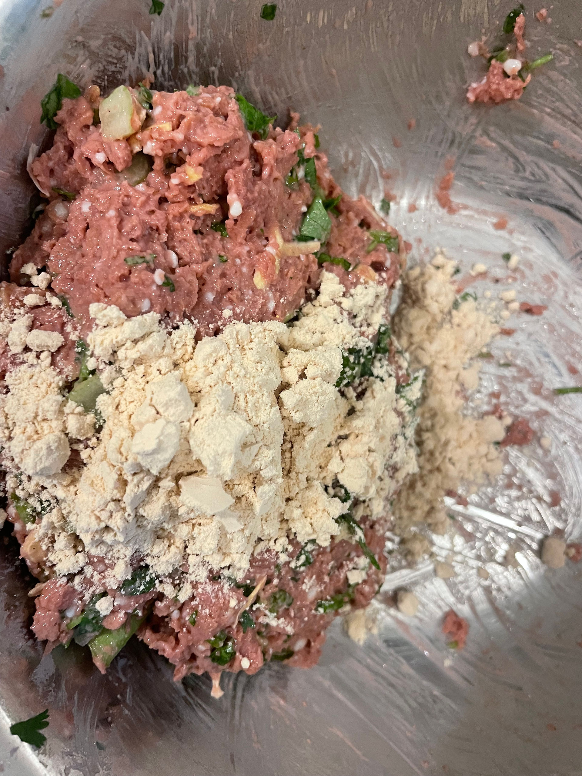 Ground, greens and light powder in a bowl