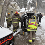 First Responders Deal with Slippery Roads in Rollover Crash