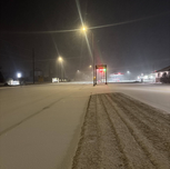 Snow Covered Landscape and Slippery Conditions 