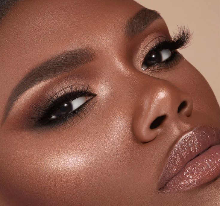 Close up image of women with natural makeup on and shimmery eyeshadow