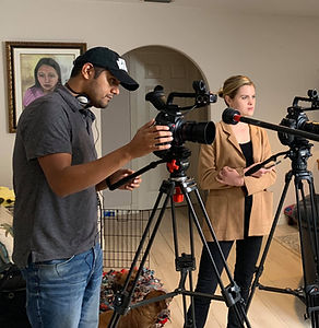 Documentary filmmaker Christian Salinas helps shoots an interview in South Texas