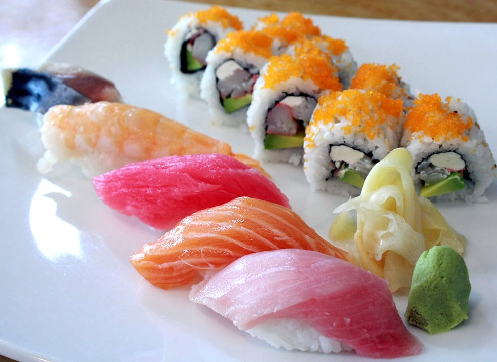Nigiri- Hamachi, Sake, Ahi, Ebi, and Saba. Roll with Kani, avocado, and cream cheese, Tobiko on top