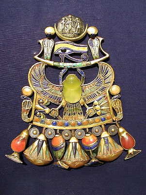 King Tutanhkamun's pendant with lime-green Moldavite in centre. Photo by Jon Bodsworth. Authentic Moldavites for sale.