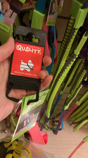 Retail package for dog collar, leash and harness - plastic hang tab