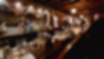 Guests gathered at Myrtle’s vintage speakeasy bar, enjoying cocktails and conversation in a warm, private event setting in downtown Sioux Falls
