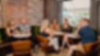 Guests enjoying craft cocktails and conversation during a private event in the Emerald Lounge at Myrtle’s Bar in downtown Sioux Falls