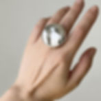 Silver ring "Cloud" on finger.