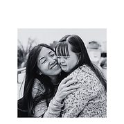 Image of mom hugging daughter with down syndrome