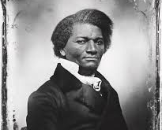 Black-and-white portrait of Frederick Douglass in formal clothing, facing forward with a serious expression.