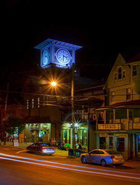 The Moviehouse and clocktower at night.