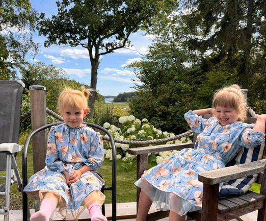 Tailor-made matching dresses for sisters