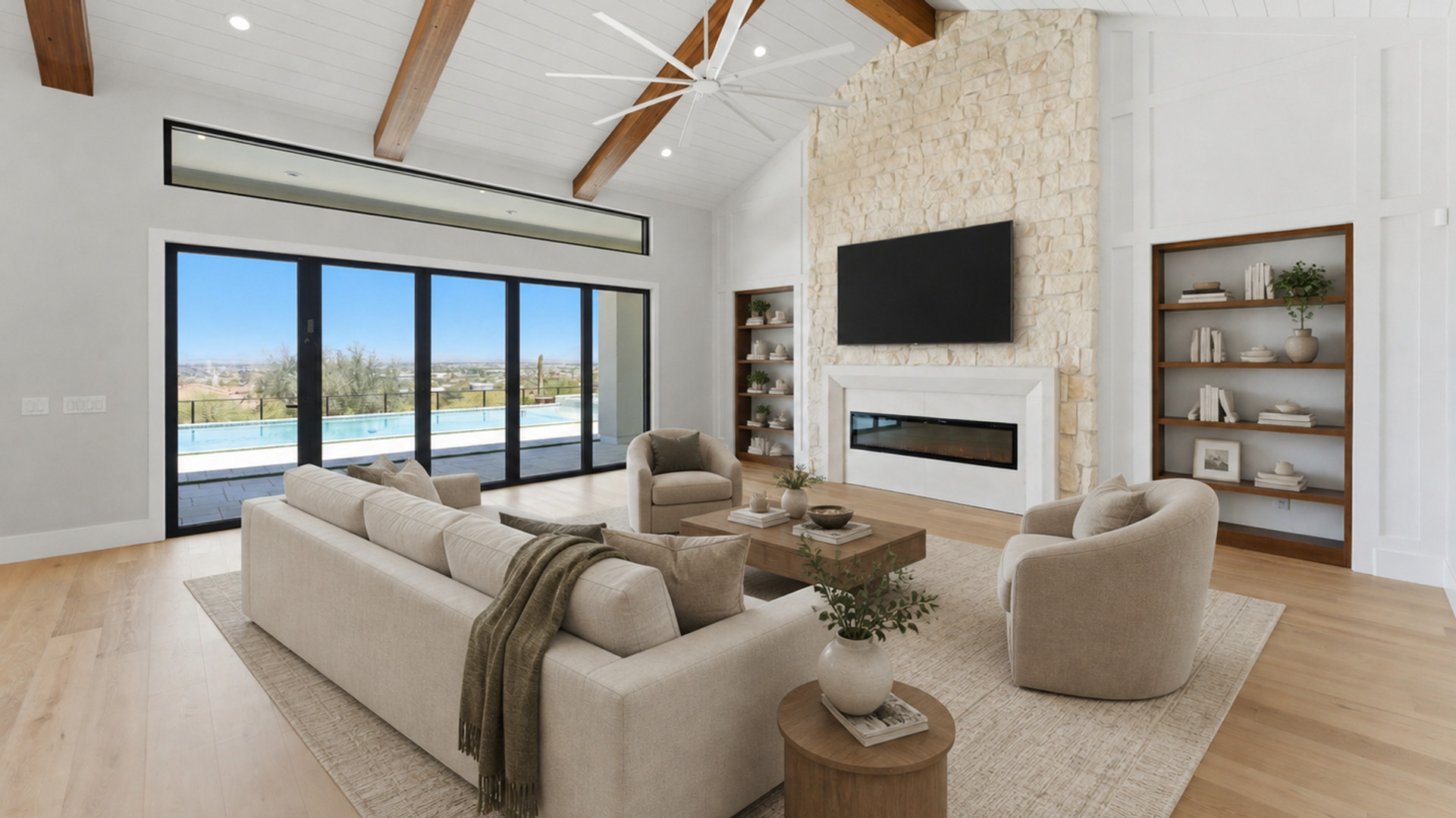 The Mirage — Great Room Interior with Vaulted Ceilings and Stone Fireplace