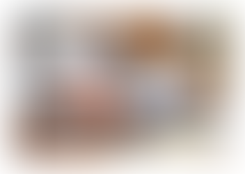 Young man at desk, exhausted and overwhelmed