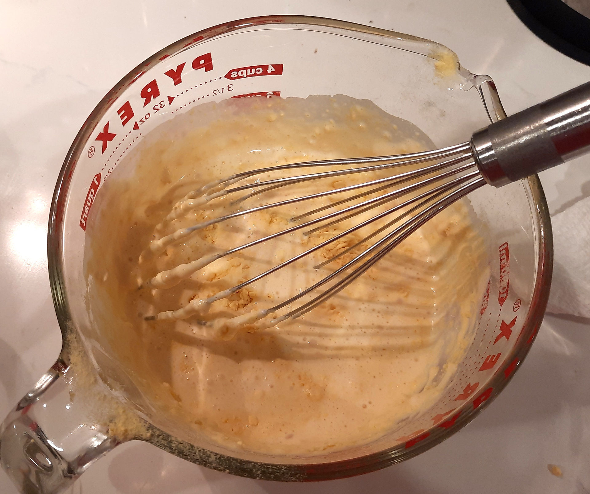 Egg yolks added to cream.