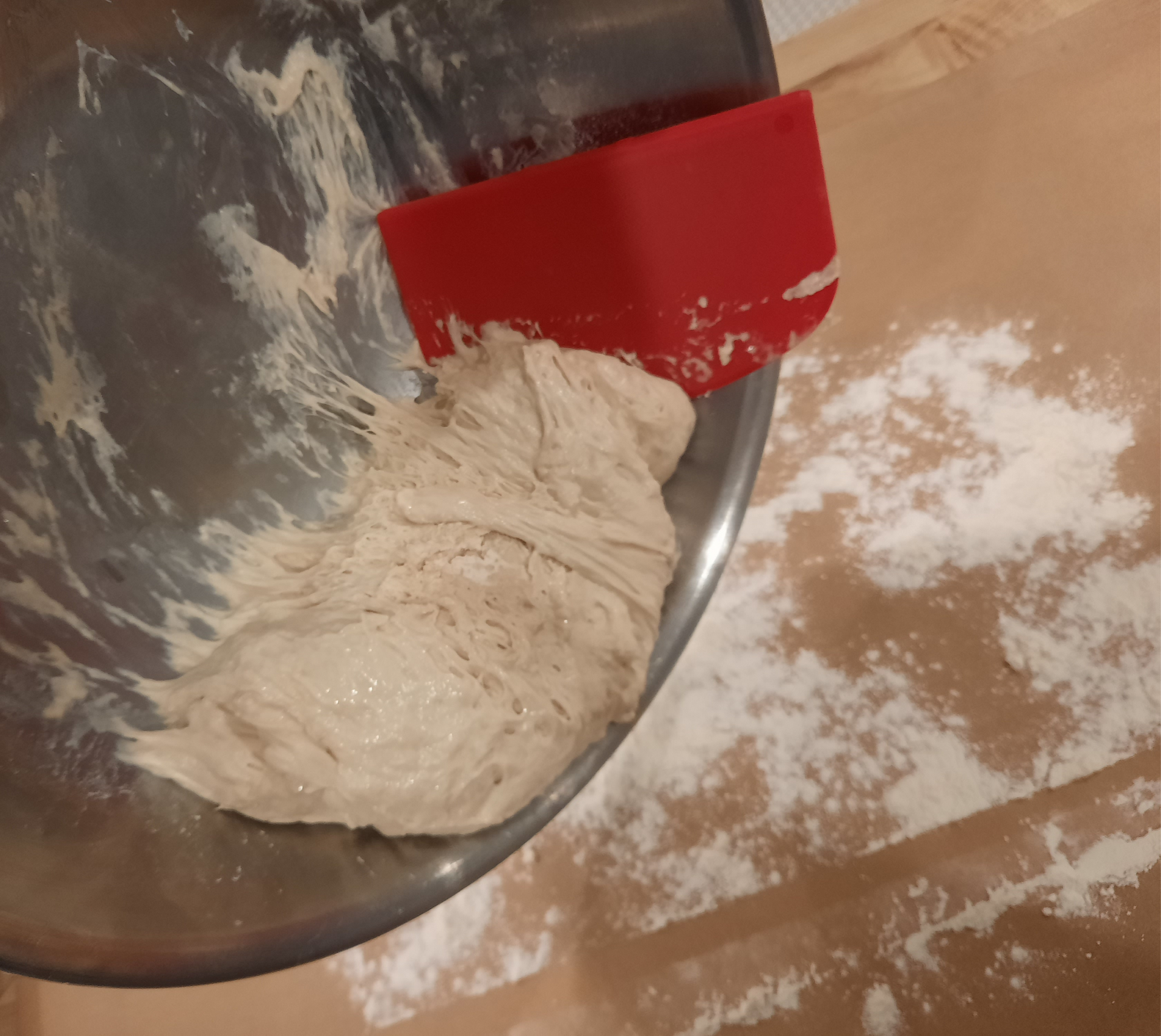 Scrape dough onto froured parchment