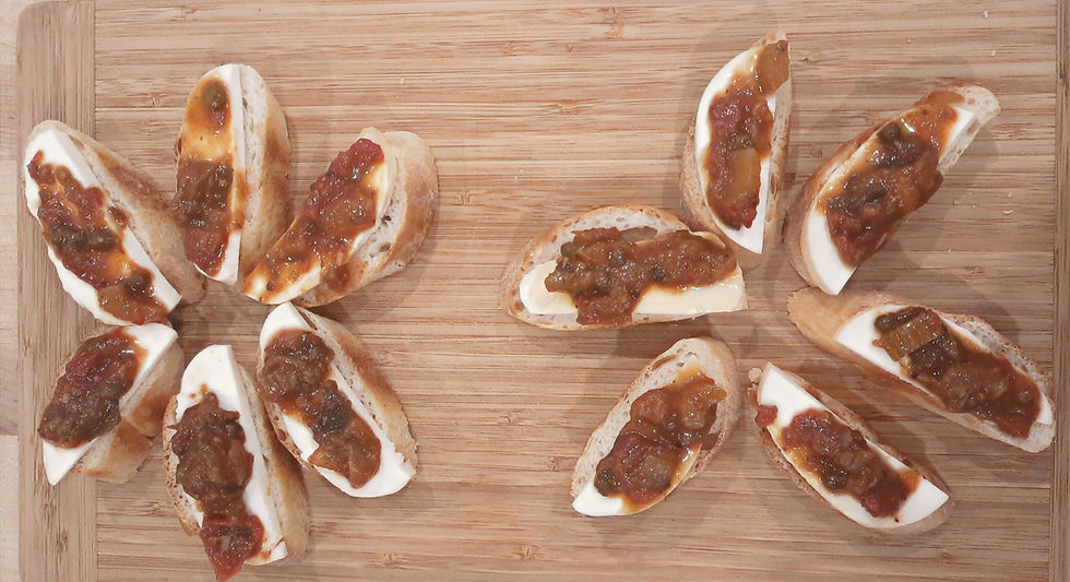 Caponata on baguette with smoked mozzarella:the start of a nice charcuterie.