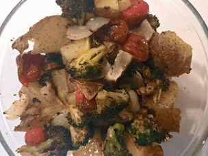 Herb roasted veggies with tomato, potato, onion, and broccoli