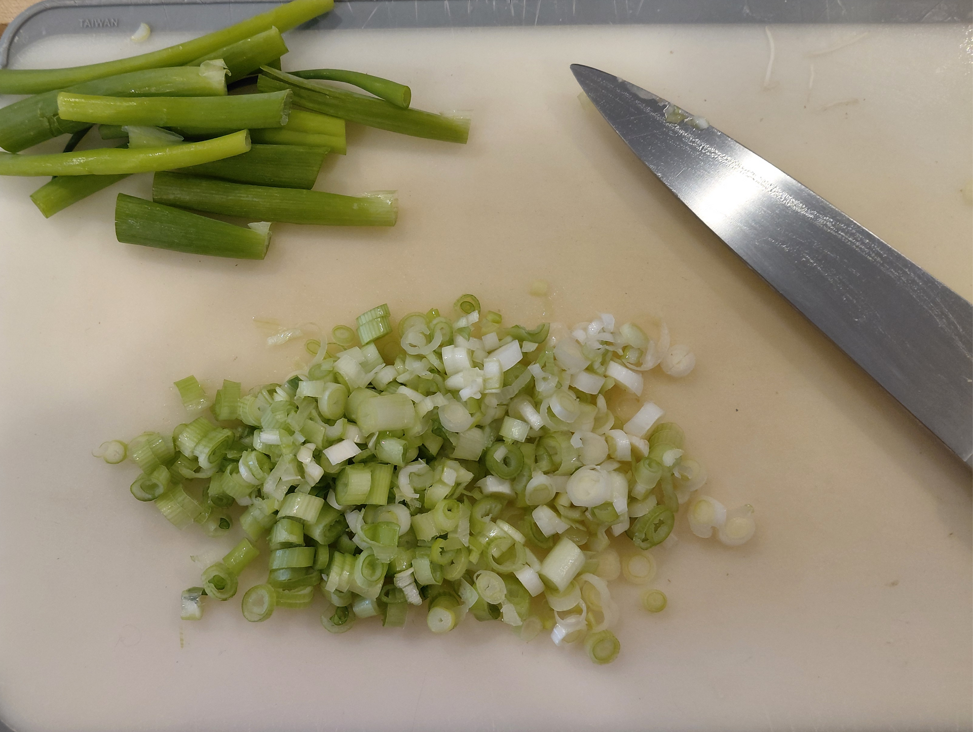 Dice onion and or scallions, reserve scallion tops