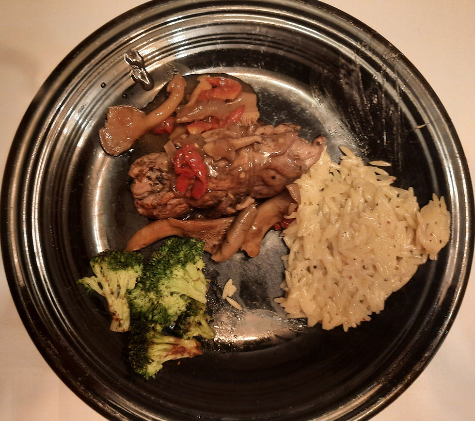 Smothered pork braciole with orzo and broccoli