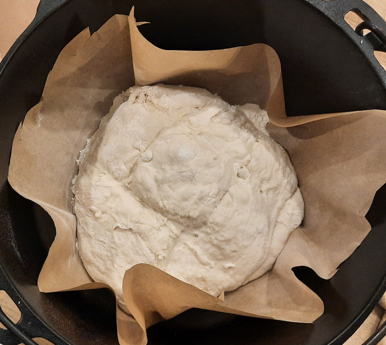 Trim parchment to not exceed height of pot