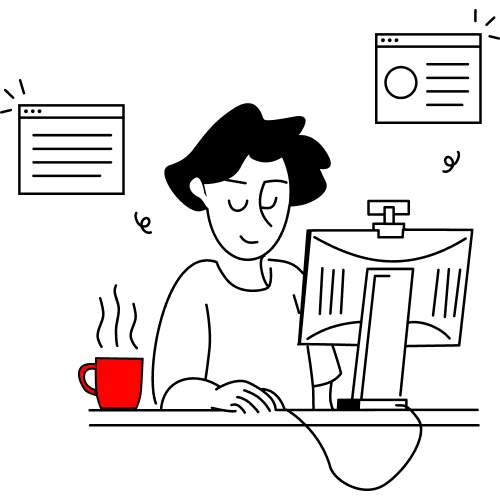 a guy using a desktop with a coffee on his desk