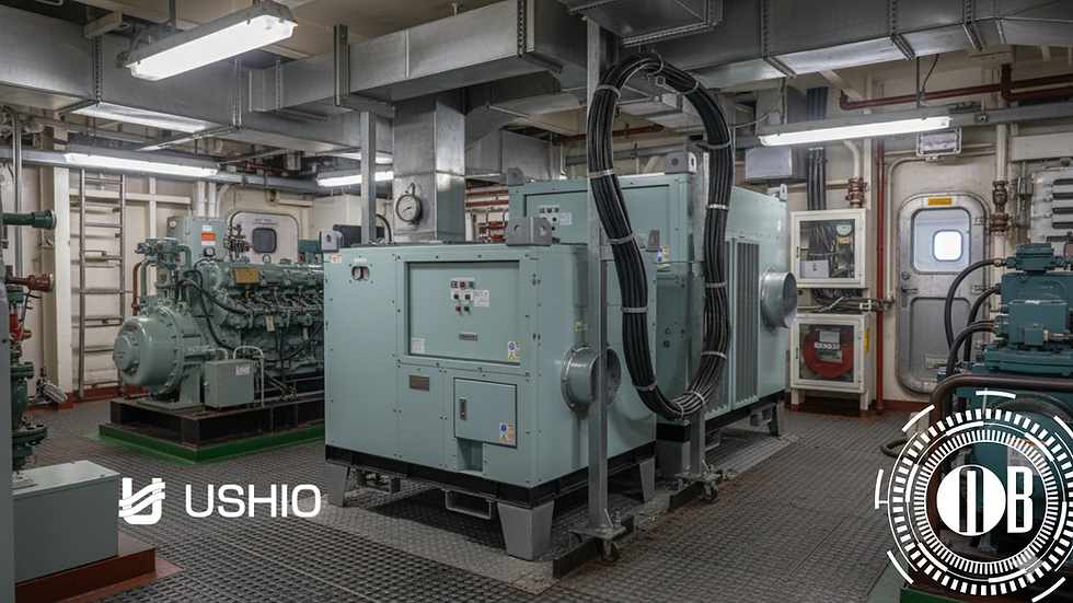 Industrial room with teal machinery, pipes, and electrical panels. Bright lighting, metal flooring. Logo text: "USHIO" and a circular emblem.