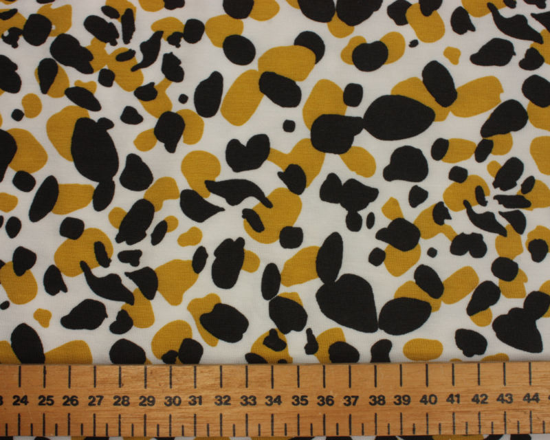 Miniatyrbild: Leopard Spots Modal Jersey on Silver Grey Background -Dressmaking, Sewing Fabric